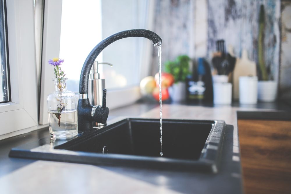 Kitchen sink and tap